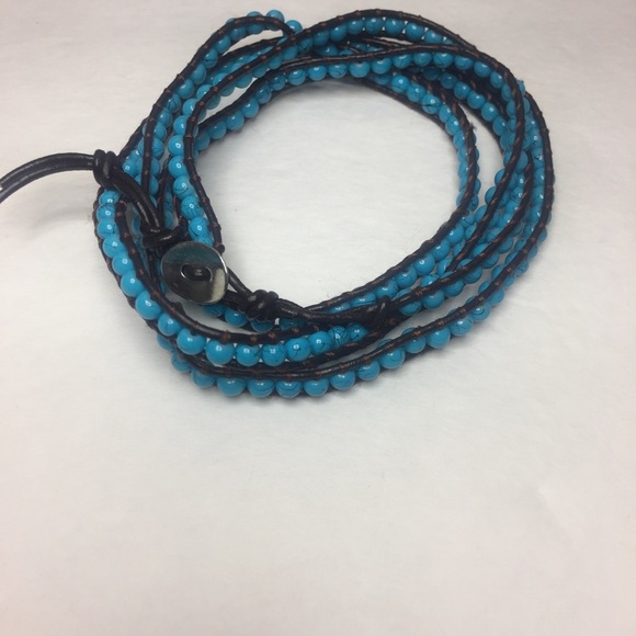 Leather(dark brown) and bead(blue) wrap bracelet.
